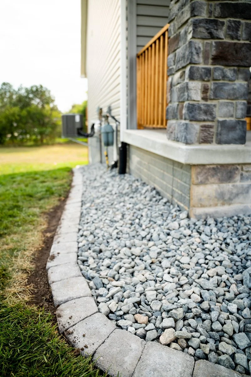 Rock edging and downspout drainage Lincoln NE