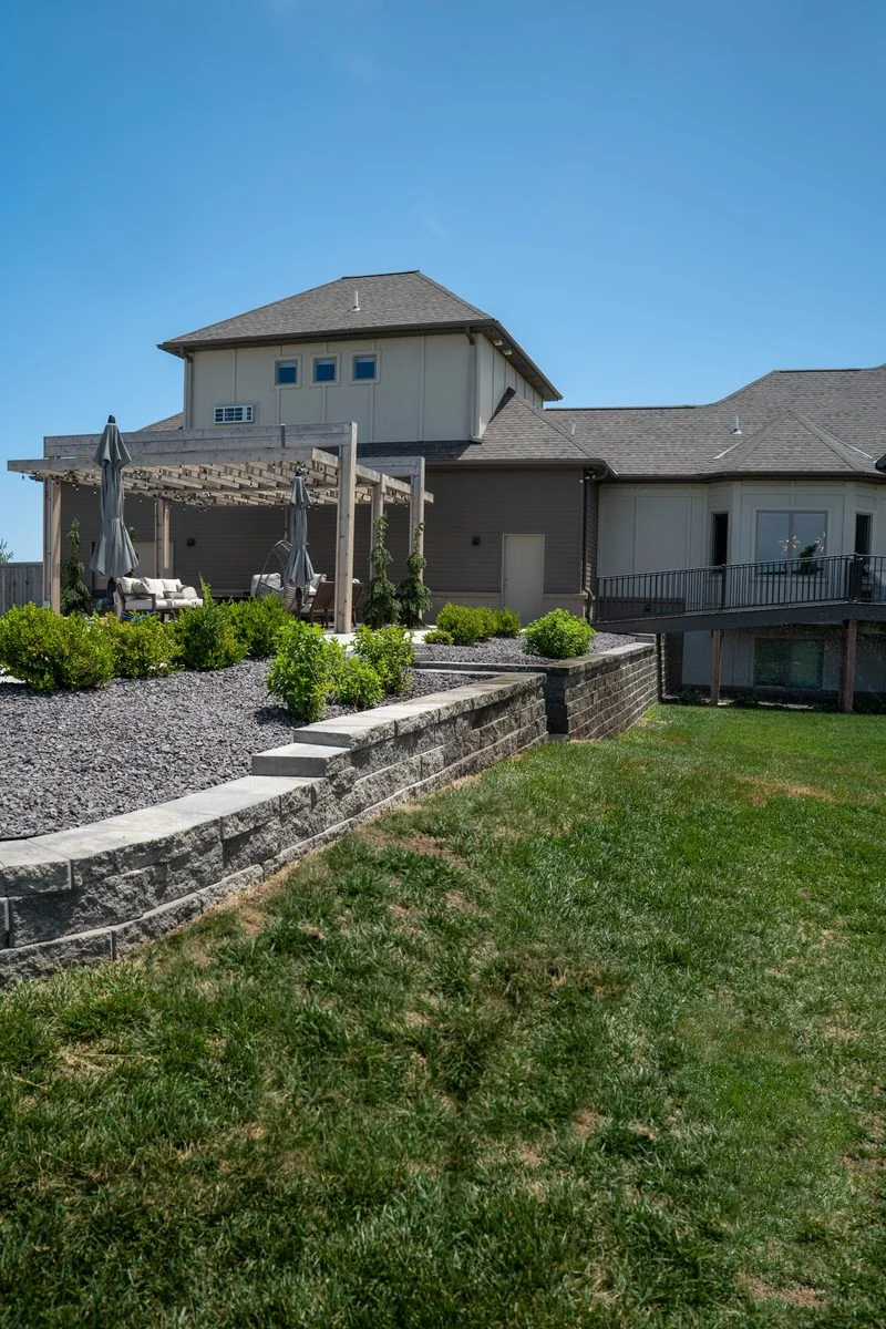Retaining wall and stairs by Creative Landscaping Lincoln NE