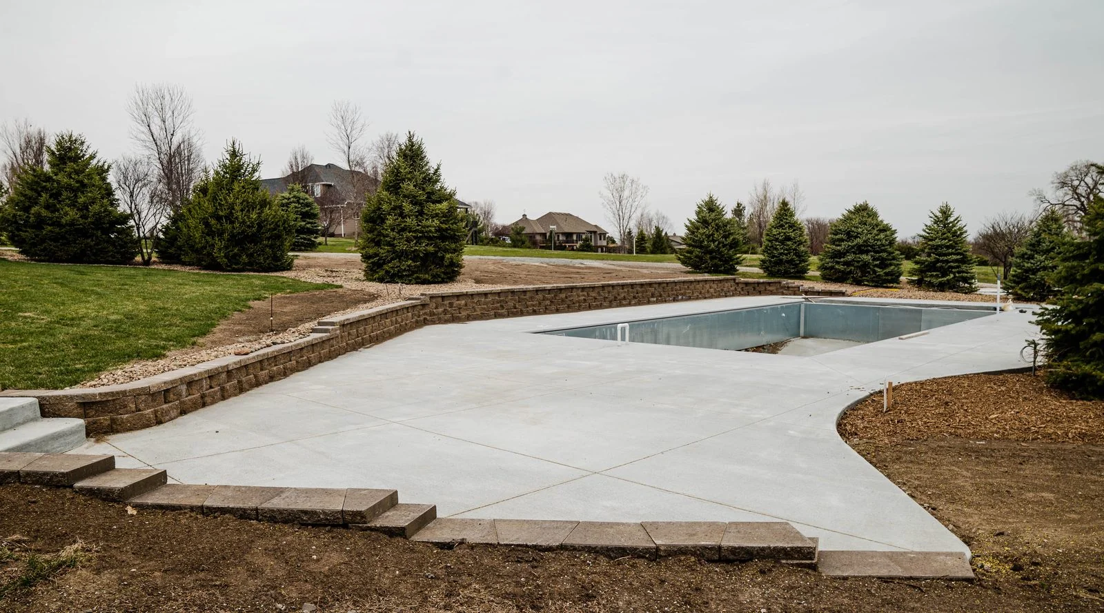 Pool surround retaining wall Lincoln NE
